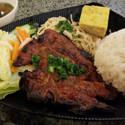 51. Com Suon Bi Cha / Grilled Pork Chop, Shredded Pork Skin, & Egg Meatloaf Rice.