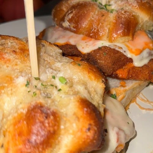 Chicken Parm Garlic Knot Vodka Sauce Sandwiches.