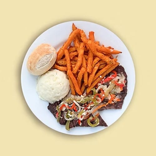 Oven-Baked Flanp meat with Peppers and Onions.