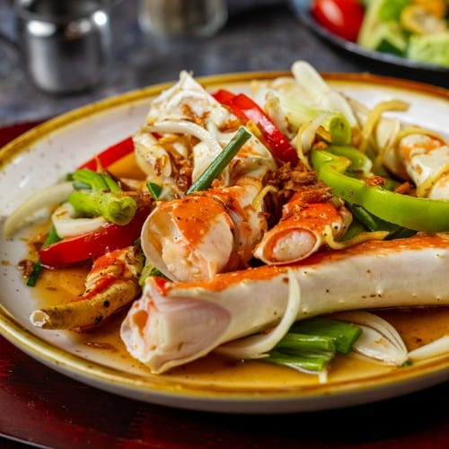 King Crab Legs with Scallion and Ginger.