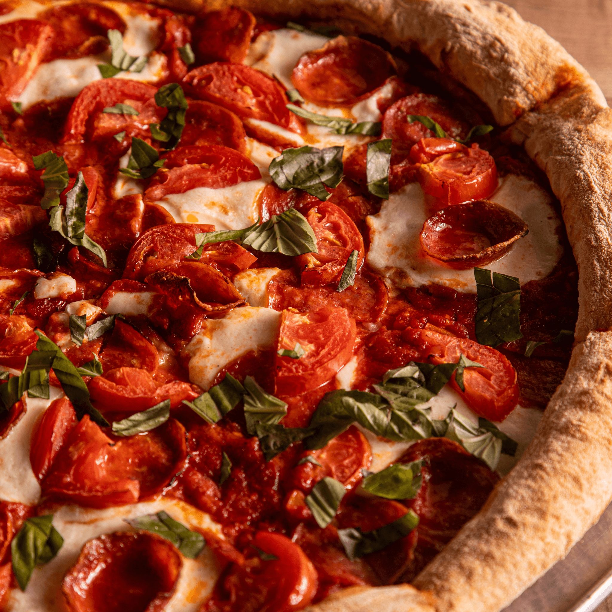 Margheroni pizza slice.