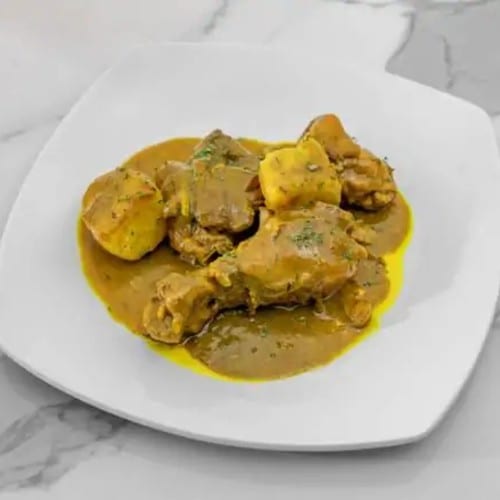 2-Curry Chicken Meal, Rice and Peas Cabbage and Plantains.