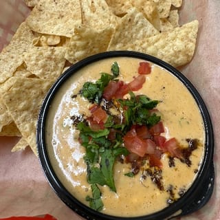 Chili Con Queso with corn tortilla chips