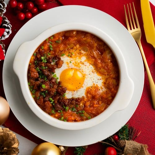 Carne Guisada & Eggs.
