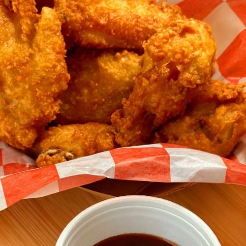 18 Crispy breaded wings, freshly fried.