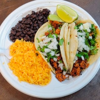 2 Chicken Tacos rice and beans