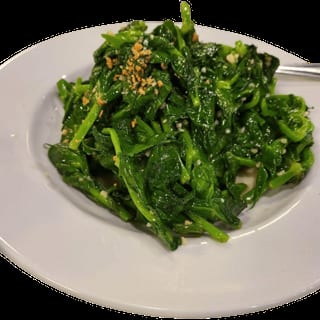 81. Braised Pea Pod Leaves W/egg Yolk / 金銀蛋浸豆苗