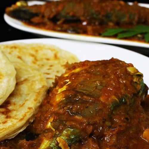 Kerala Paratha with Fish Curry.