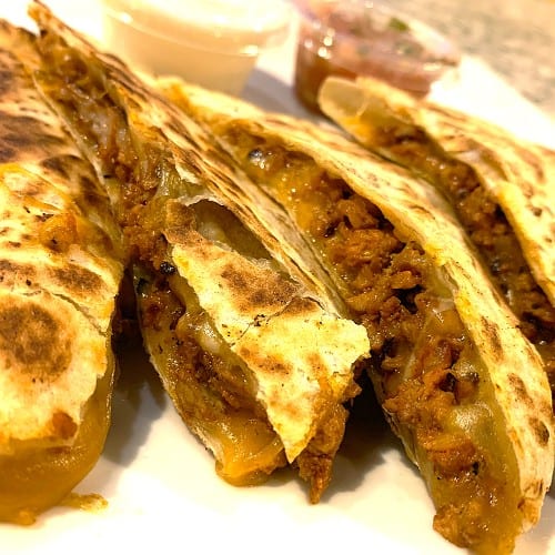 SPICY PORK QUESADILLA.