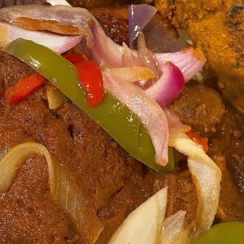 Waakye with Stewed Goat.