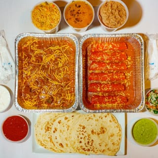 #3 Carne Guisada & Tex-Mex Enchiladas Combo