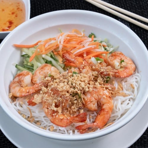 V9. Char-Grilled Marinated Shrimp over Vermicelli.