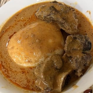 Fufu and  Goat meat groundnuts soup