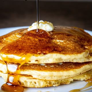 Free side of pancakes with any breakfast entrée on Mondays (while supplies last).