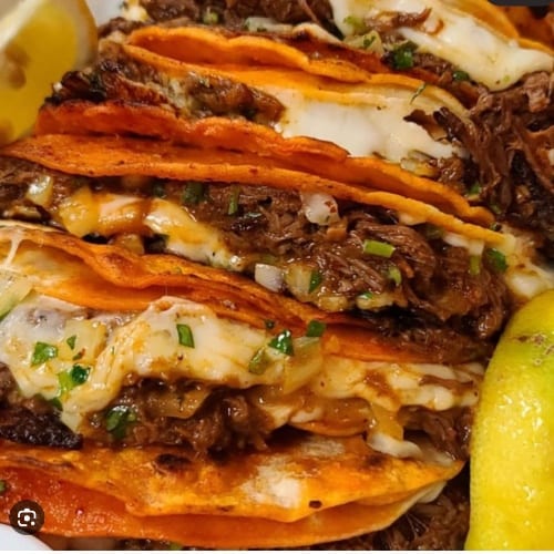 QuesaBirria tacos.