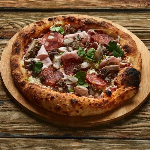 Pepperoni, Sausage & Ham Stuffed Pizza (Slice).