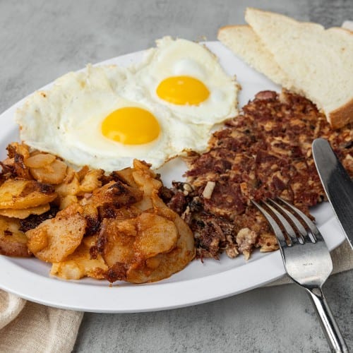 2 Extra Large Eggs with Homemade Corned Beef Hash.