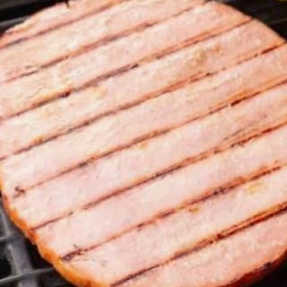 HAM STEAK WITH TWO EGGS