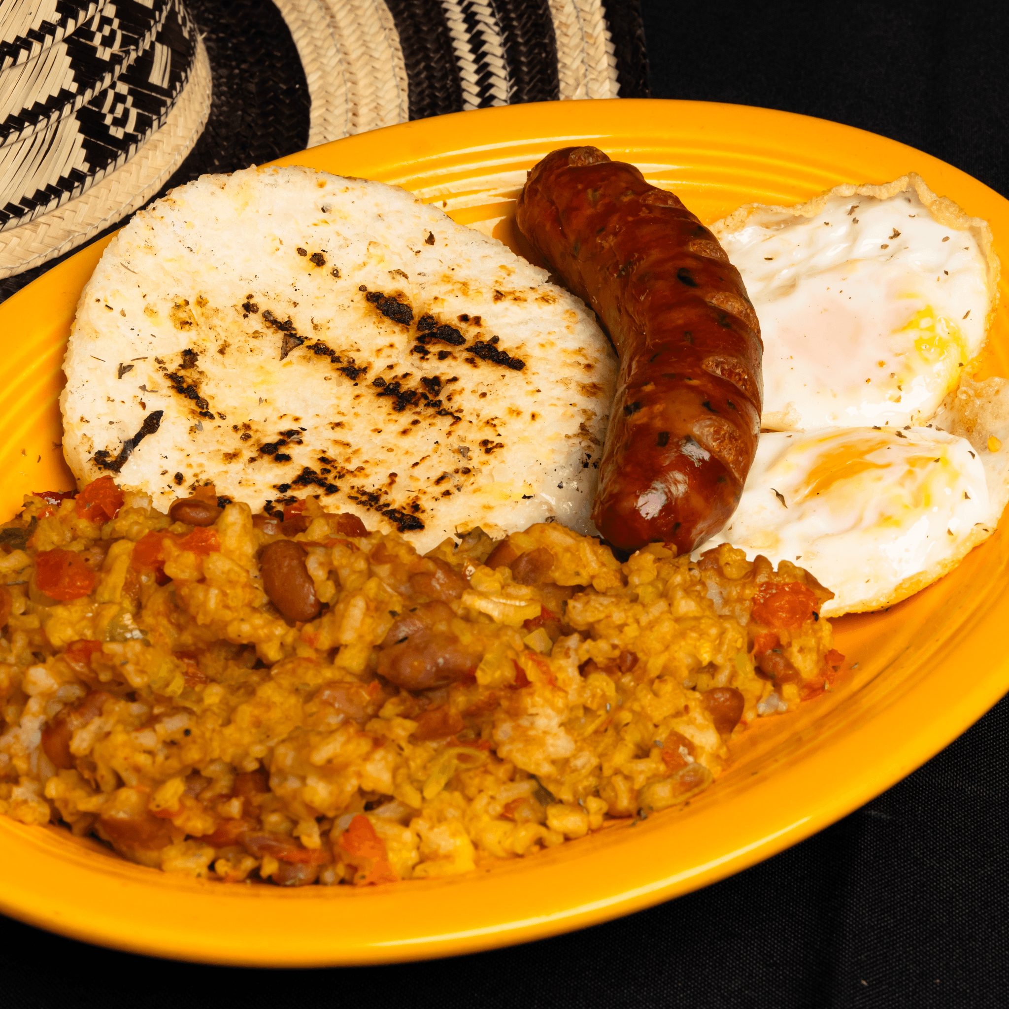 Calentado, Huevos, Chorizo Y Arepa.