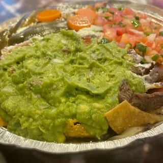 71. Nachos Con Bistec