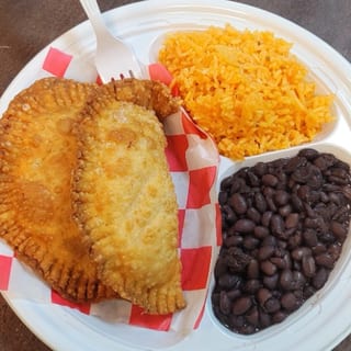 2 Chicken Empanadas rice and beans