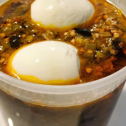 Banku And Okra Soup w/ Chicken and Fish.