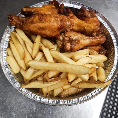 Fry wings with crispy potatoes fries.