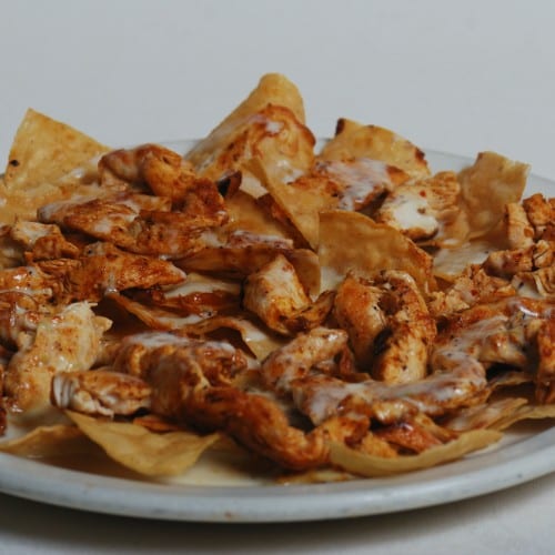 Famous Grilled Chicken Nachos.