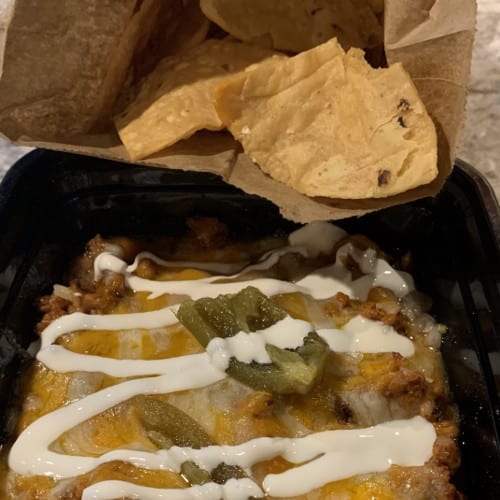 NACHOS WITH SPICY PORK.