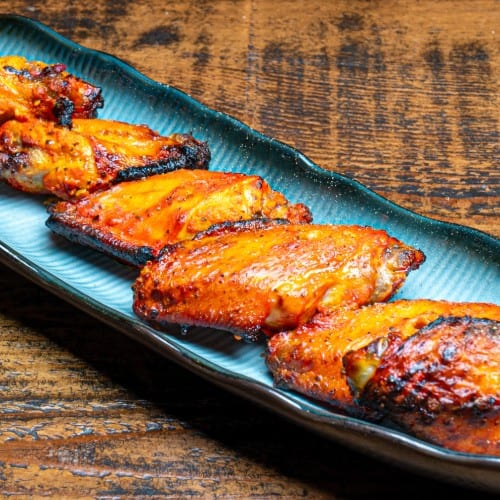 TANDOORI BUTTER WINGS.
