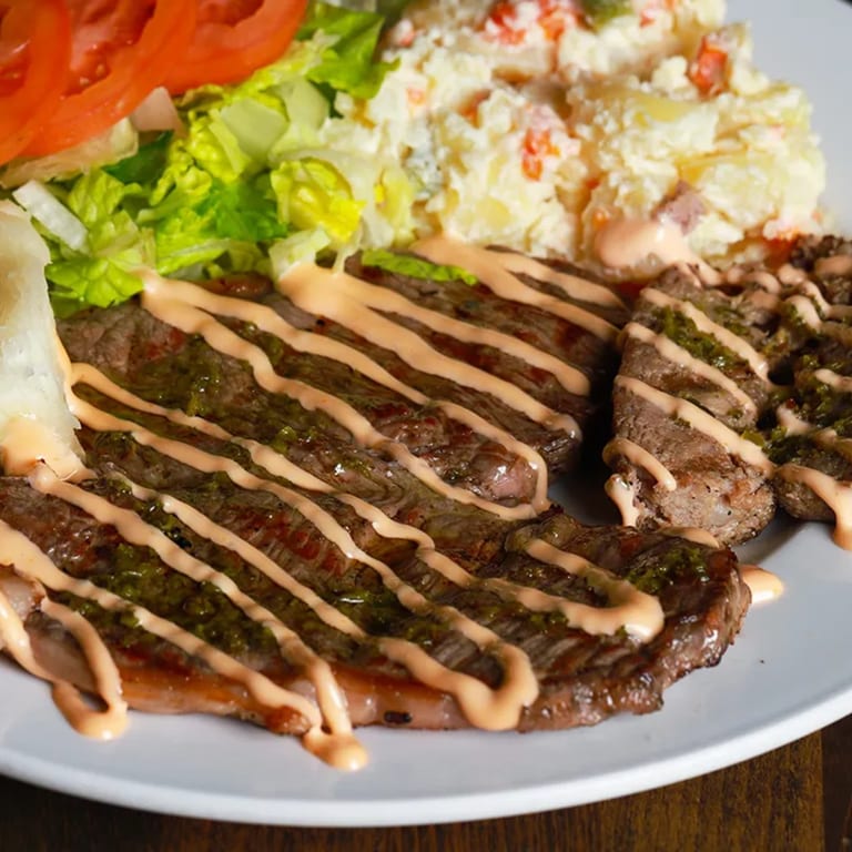 Try Parrilla Corriente: A Taste of Tradition 🥩