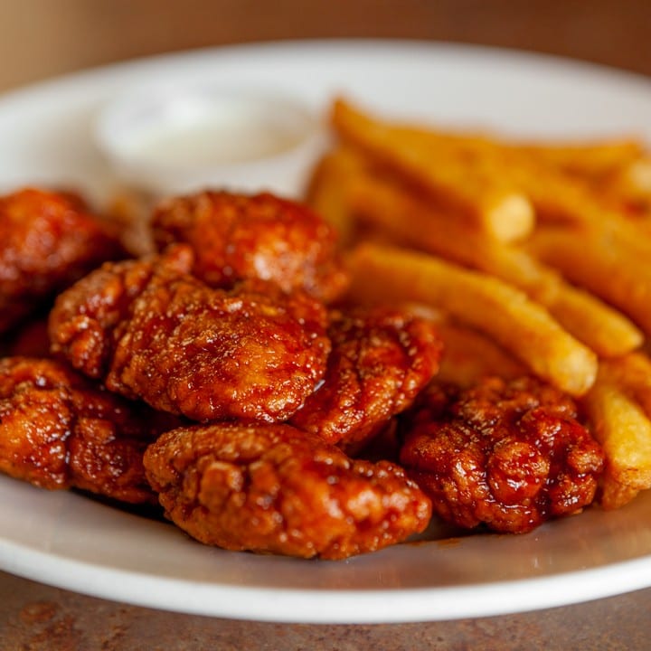 BONELESS BUFFALO AND FRIES.