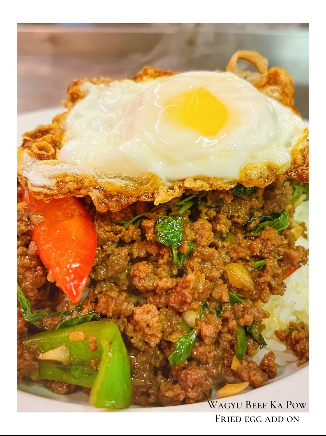 Wagyu Beef Ka Pow Over Rice with Fried Egg.