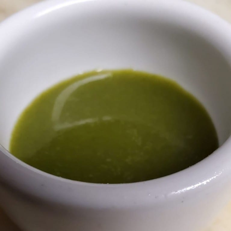 Side of cilantro chutney.