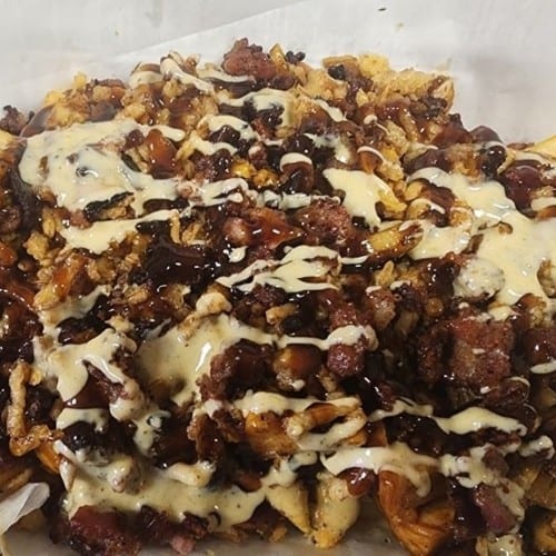 BBQ Chicken & Bacon Queso Fries.
