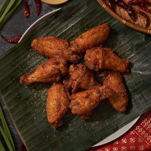 Shlap Muan (Wings) (16 Pieces ).