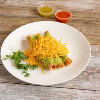 3 Rolled Tacos with Guacamole