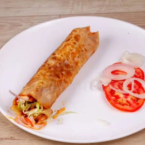 Veg Springroll - tossed in Schezwan Sauce.