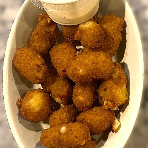 SPICY CHEESE CURDS.