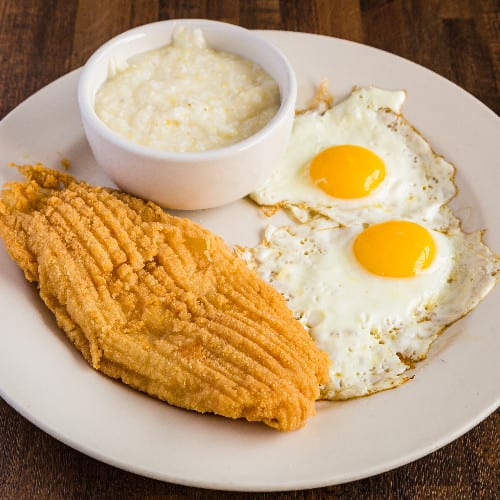 2 Eggs with Fish and Grits.