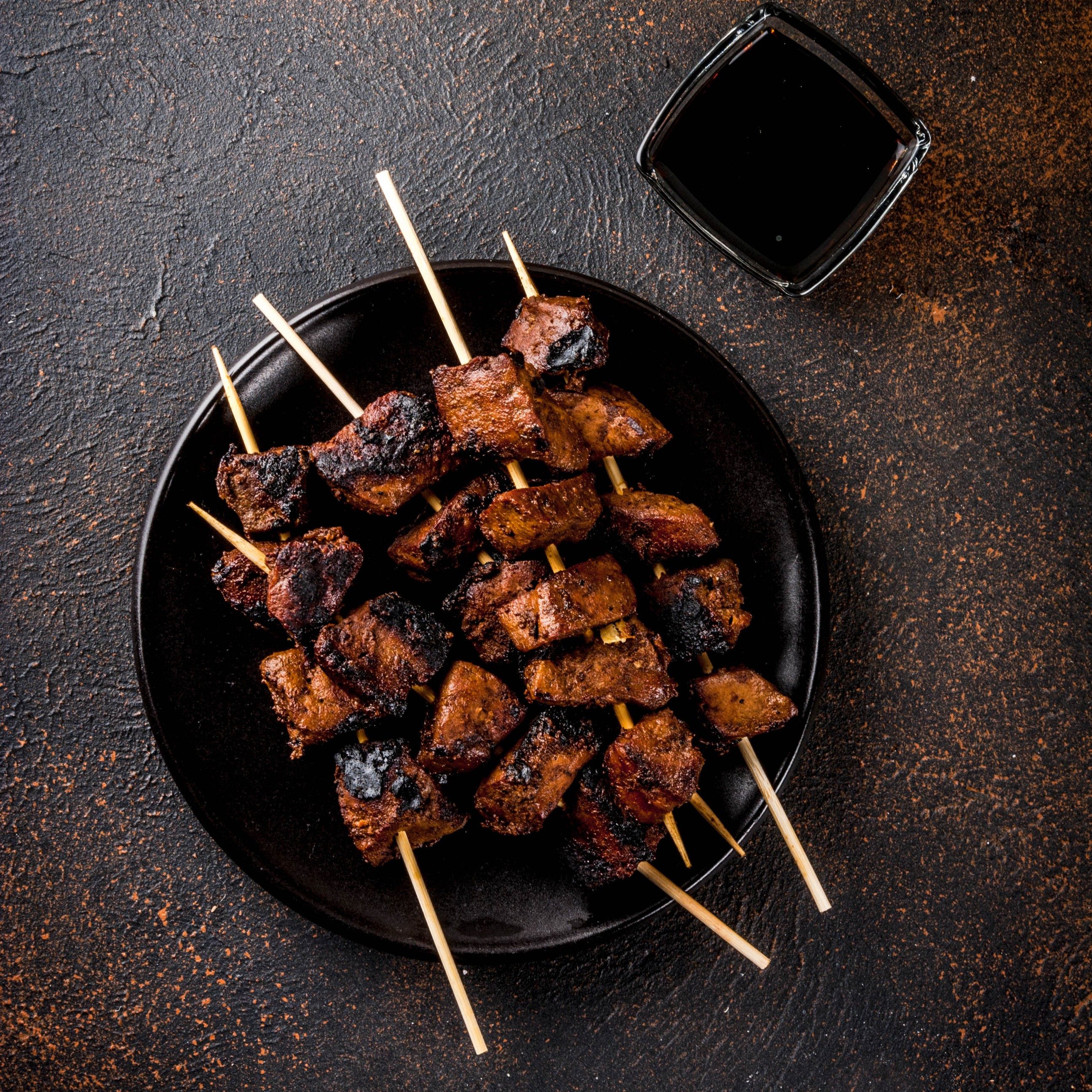 Pork BBQ on skewer.