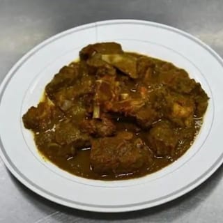 Curry Goat Rasta Paata Cabbage and Plantains