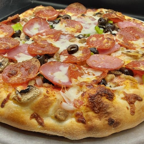 Deep Dish Special 9 Toppings Pizza.