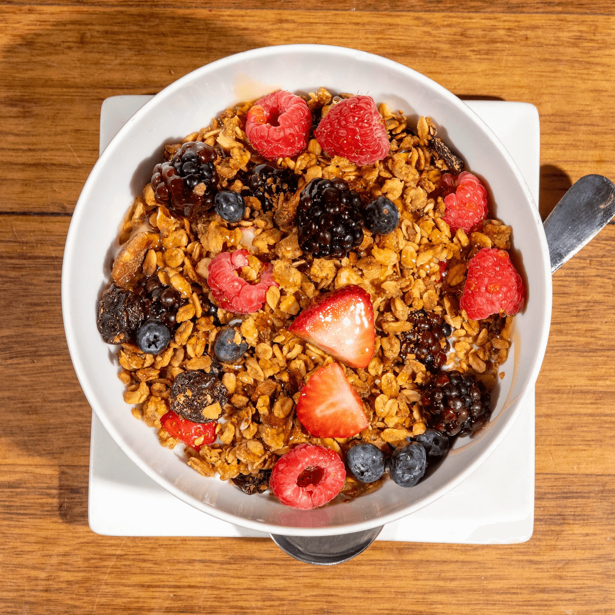 Homemade Granola with Vanilla Yoghurt & Fresh Fruit.