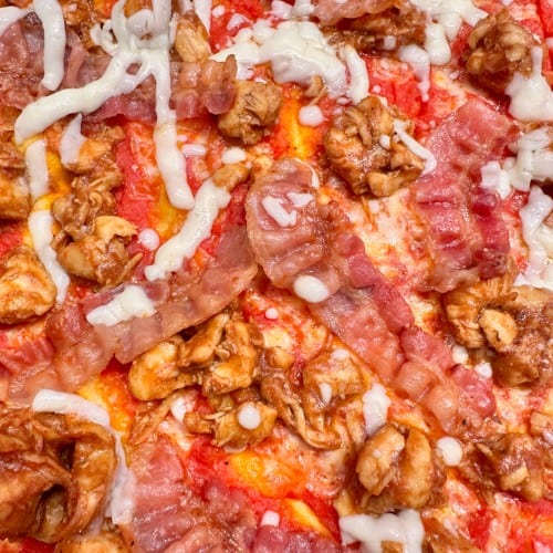 BBQ Chicken & Bacon Pizza With Red Sauce.