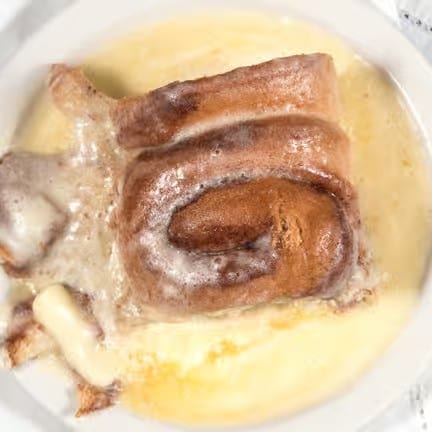 Large Cinnamon Roll with Cream Cheese Topping.