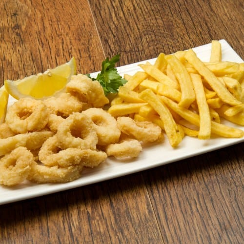 Calamari Served with French Fries.