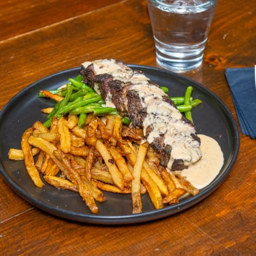 Tri Peppercorn Crusted Flat Iron Steak.