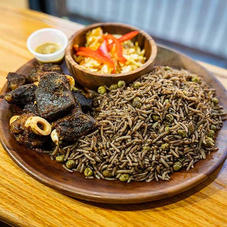 Black Rice & Fried Goat A Haitian Feast Awaits You