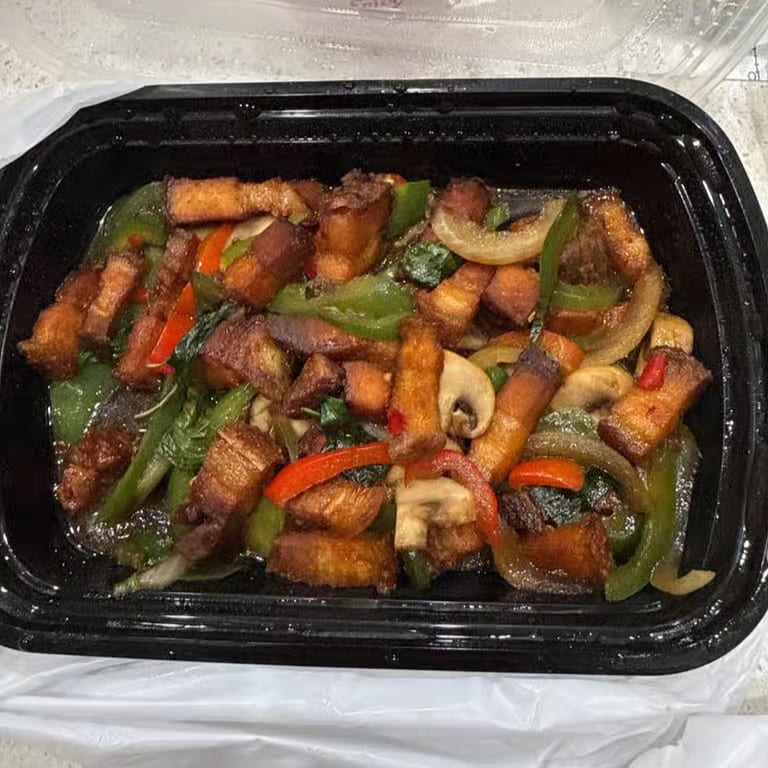 Spicy Basil Leaves with Crispy Pork Belly / ผัดกระเพราหมูกรอบ.